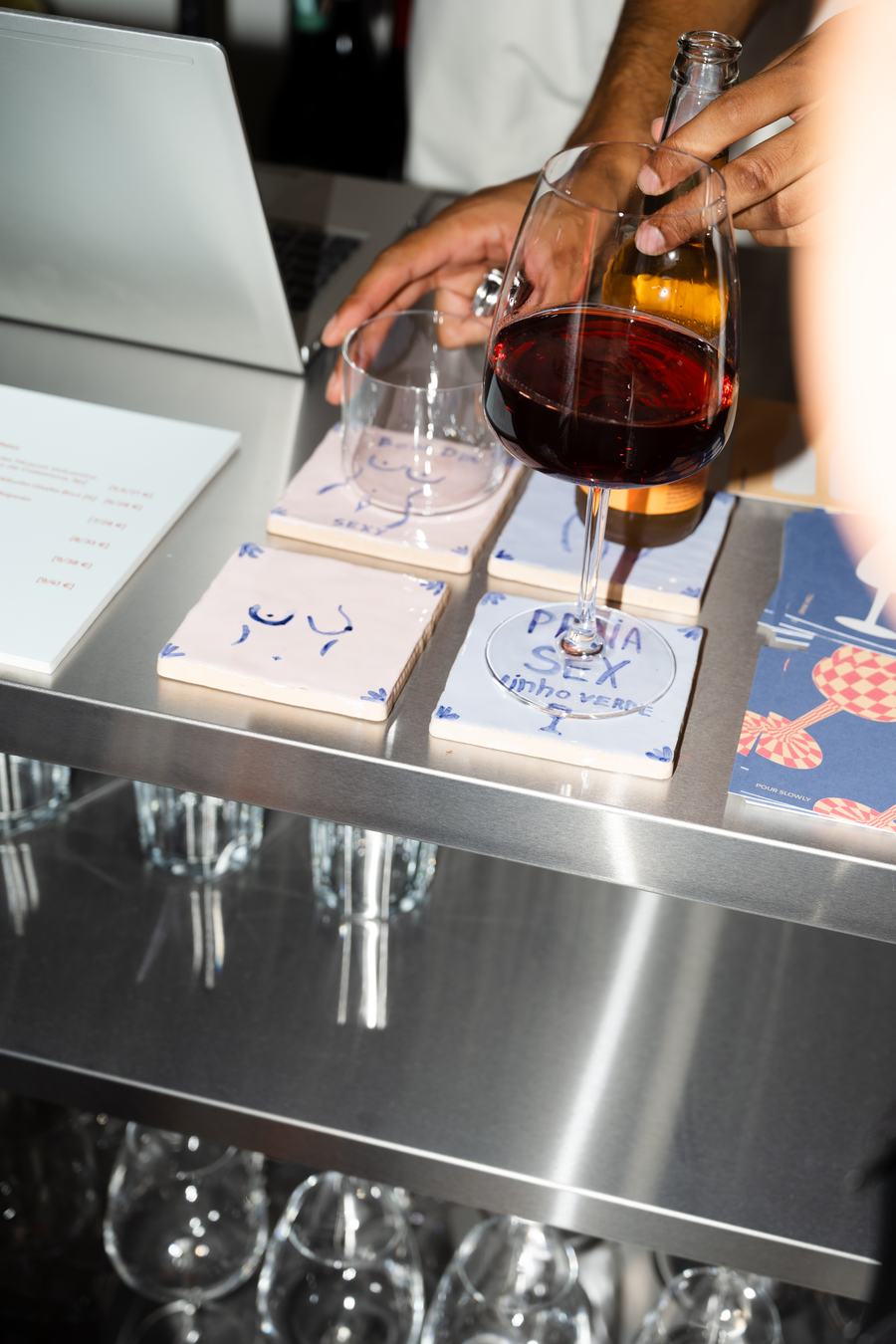 A glass of red on the bar top at Levö