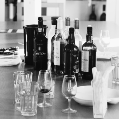 Assorted styles of port wine and port wine glasses set for a tasting